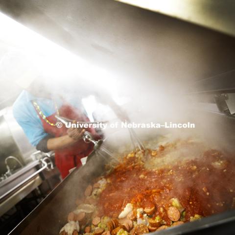 Chef Ron White makes his seafood jambalaya steam while cooking a batch for the evening meal. It's Fat Tuesday at the East Campus Dining Hall. Chef Ron White, who grew up in uptown New Orleans and has been in Nebraska for 10 years, prepares his traditional