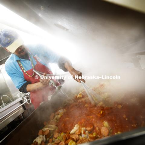 Chef Ron White makes his seafood jambalaya steam while cooking a batch for the evening meal. It's Fat Tuesday at the East Campus Dining Hall. Chef Ron White, who grew up in uptown New Orleans and has been in Nebraska for 10 years, prepares his traditional