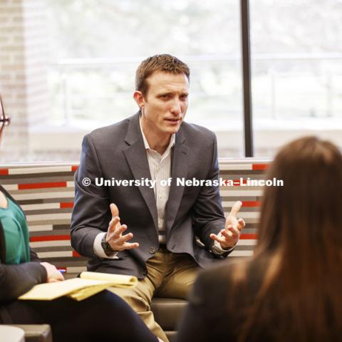 Ryan Sullivan, assistant professor with law students. College of Law photo shoot. March 8, 2017. Photo by Craig Chandler / University Communication.