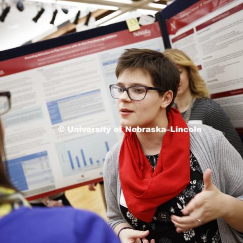 Rebekah Hutchinson discusses her research in parenting behaviors in play sessions with at-risk preschool children. The first day of the Spring Research Fair features undergraduate student research. April 4, 2017. Photo by Craig Chandler / University