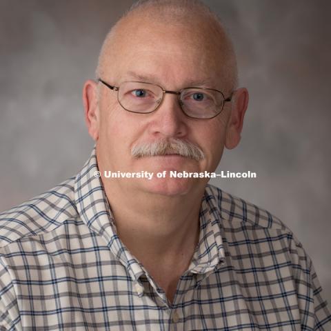Studio portrait of Mark Lee, Lecturer, History. April 19,2017. Photo by Greg Nathan, University Communication Photography