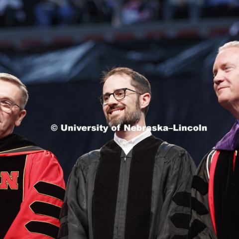 Chancellor Ronnie Green, Evan Williams, (Nebraska native and founder of Twitter), and Regent Timothy Clare listen to William's introduction. Students received their undergraduate diplomas Saturday morning in Lincoln's Pinnacle Bank Arena. 2452 degrees