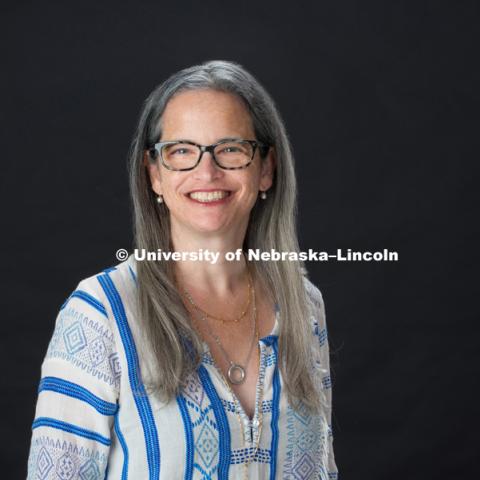 Studio portrait of Lydia Neuman, Head of Exhibitions for Textiles, Merchandising, and Fashion Design, CEHS. July 6, 2017. Photo by Greg Nathan, University Communication Photography.