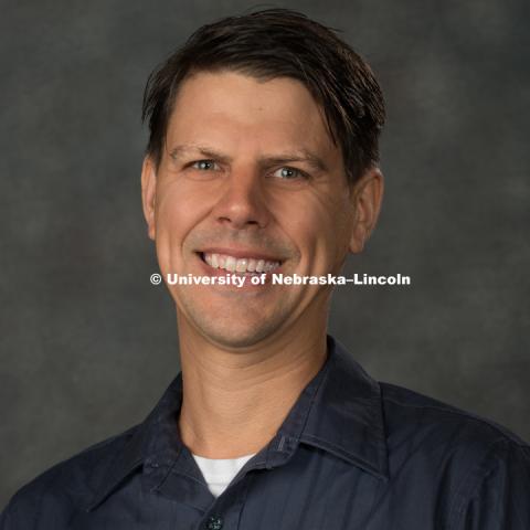 Studio portrait of Marc Brennan, Associate Professor, Special Education and Communication Disorders. New Faculty Orientation. August 16, 2017. Photo by Greg Nathan, University Communication Photography.