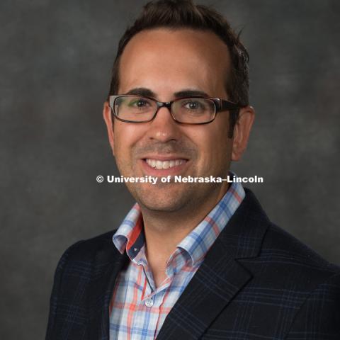 Studio portrait of Casey Kelly, Associate Professor, Communication Studies, College of Arts and Sciences. New Faculty Orientation. August 16, 2017. Photo by Greg Nathan, University Communication Photography.