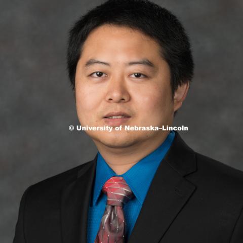 Studio portrait of Shengchao Zhuang, Assistant Professor of Finance, College of Business. New Faculty Orientation. August 16, 2017. Photo by Greg Nathan, University Communication Photography.