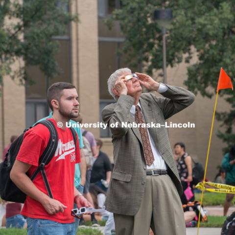 Former chancellor, Martin A. Massengale views the eclipse with east campus students, faculty and staff at the University of Nebraska-Lincoln. August 21, 2017. Photo by Greg Nathan, University Communication Photography.