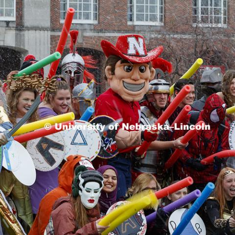 Herbie Husker joins the University of Nebraska–Lincoln’s Department of Classics and Religious Studies in their annual battle using pool noodles. This year they reenacted the battle of Troy. October 31, 2017. Photo by Craig Chandler / University