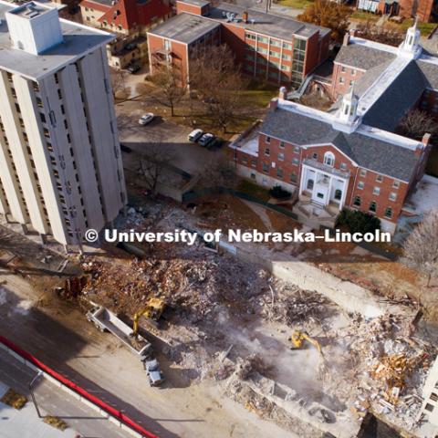 The rubble of Cather Pound dining center is being removed. The two residence halls will be imploded on December 22, 2017. November 30, 2017. Photo by Craig Chandler / University Communication.