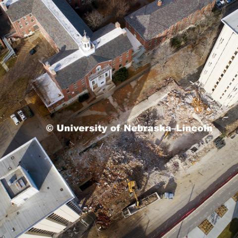 The rubble of Cather Pound dining center is being removed. The two residence halls will be imploded on December 22, 2017. November 30, 2017. Photo by Craig Chandler / University Communication.