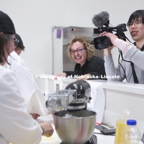 Dairy plant manager Josie Kranz talks to Team Five as grad student Soon Kiat Lau live streams video during the 2018 Battle of the Food Scientists at the Food Innovation Center on Nebraska Innovation Campus. February 28, 2018. Photo by James Wooldridge,