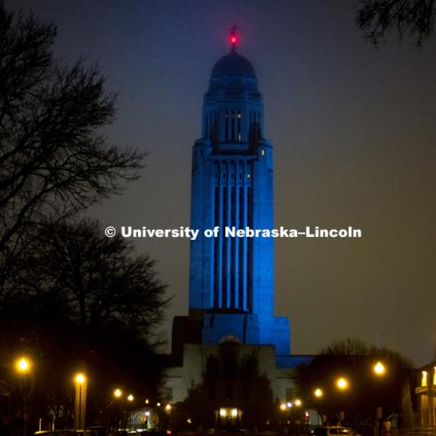 The state Capitol was lit in blue light Monday night. Light It Up Blue is an initiative of Autism Speaks sponsored by the Munroe-Meyer Institute which is part of UNMC. April 2, 2018. Photo by Alyssa Mae for University Communication.