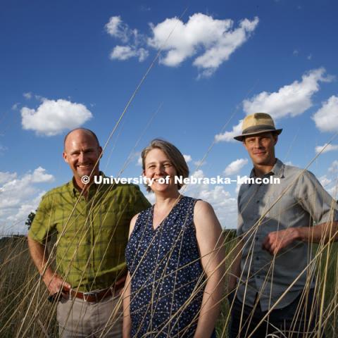 Jay Storz, Kristi Montooth, Colin Meiklejohn research animal and plant changes to their environment. Photo at Nine Mile Prairie northwest of Lincoln. May 30, 2018. Photo by Craig Chandler / University Communication.