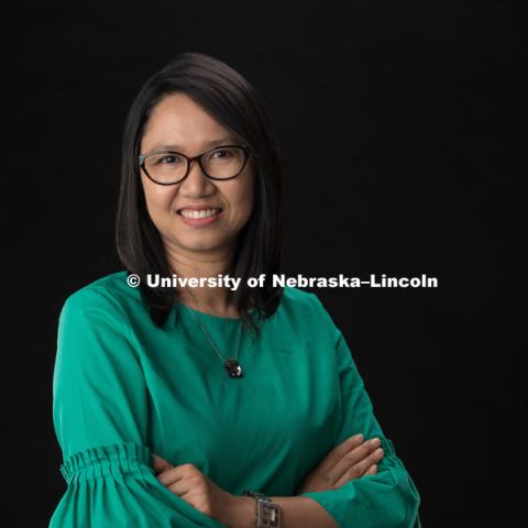 Studio portrait of Anusana Abdel-Monem, Exhibitions Assistant, International Quilt Study Center and Museum. July 17, 2018. Photo by Greg Nathan, University Communication Photography.