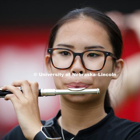 Piccolo player Caroline Melson. Cornhusker Marching Band practice.  August 13, 2018. Photo by Craig Chandler / University Communication.