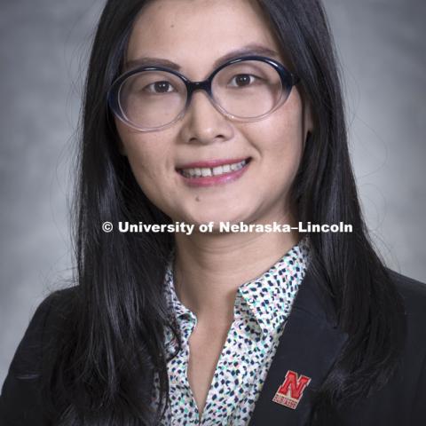 Studio portrait of Yingchao Lan, Assistant Professor, College of Business. August 17, 2018. Photo by Greg Nathan, University Communication Photography.