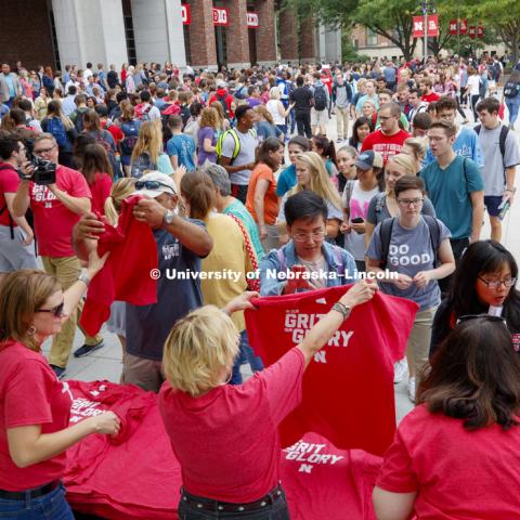 The line for the t-shirts stretches across the plaza as the line for food stretches back across. In Our Grit, Our Glory brand reveal party on city campus at the Nebraska Union. August 30, 2018. Photo by Craig Chandler / University Communication.