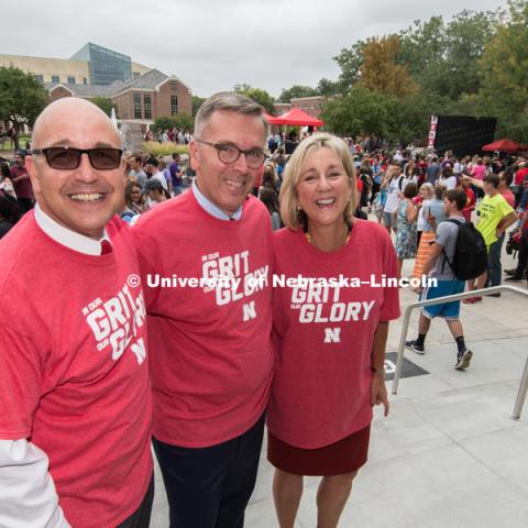 Michael Boehm, IANR Vice Chancellor, Ronnie Green, Chancellor, and Donde Plowman, Executive Vice Chancellor and Chief Academic Officer, pose together in their Grit and Glory shirts at the brand launch party on city campus. In Our Grit, Our Glory brand reveal party on city campus at the Nebraska Union. August 30, 2018. Photo by Greg Nathan, University Communication.