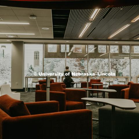 Students studying in the Adele Learning commons look out over the snow covered campus. January 12, 2019. Photo by Justin Mohling, University Communication.
