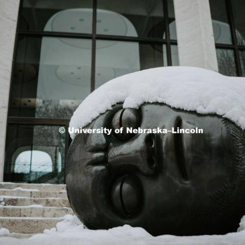 The Fallen Dreamer sculpture is covered in snow outside the Sheldon Art Gallery. January 12, 2019. Photo by Justin Mohling, University Communication.