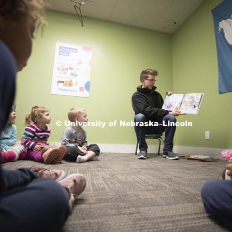 Thomas Kerr, freshman in accounting from Hastings, reads to children Monday morning at the Foundations Progressive Learning Center. Husker Reading Challenge. Students, faculty and staff are invited to honor King’s legacy through a day of service. In collaboration with Prosper Lincoln and Read Aloud Lincoln, the Center for Civic Engagement at Nebraska will host the reading challenge. January 21, 2019. Photo by Craig Chandler / University Communication.