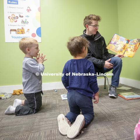 Thomas Kerr, freshman in accounting from Hastings, reads to children Monday morning at the Foundations Progressive Learning Center. Husker Reading Challenge. Students, faculty and staff are invited to honor King’s legacy through a day of service. In collaboration with Prosper Lincoln and Read Aloud Lincoln, the Center for Civic Engagement at Nebraska will host the reading challenge. January 21, 2019. Photo by Craig Chandler / University Communication.