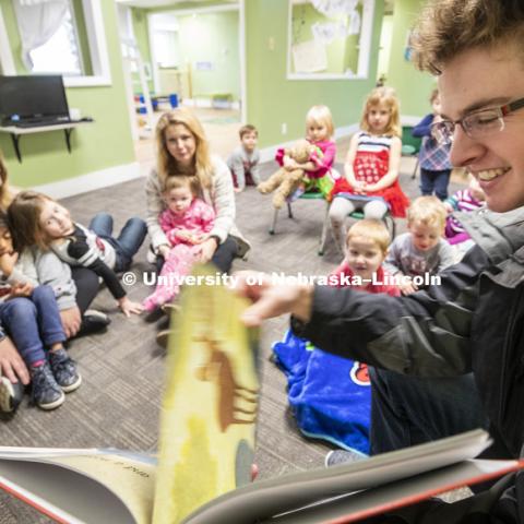 Thomas Kerr, freshman in accounting from Hastings, reads to children Monday morning at the Foundations Progressive Learning Center. Husker Reading Challenge. Students, faculty and staff are invited to honor King’s legacy through a day of service. In collaboration with Prosper Lincoln and Read Aloud Lincoln, the Center for Civic Engagement at Nebraska will host the reading challenge. January 21, 2019. Photo by Craig Chandler / University Communication.