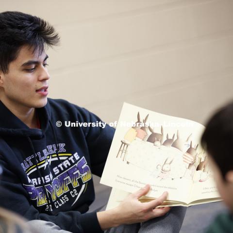Mario Esquivel, freshman in civil engineering, from Battle Creek, NE, read at the YMCA of Lincoln-Northeast as part of the Husker Reading Challenge. The UNL students reading at the Y are part of the Chancellor's Leadership Class. Students, faculty and staff are invited to honor King’s legacy through a day of service. In collaboration with Prosper Lincoln and Read Aloud Lincoln, the Center for Civic Engagement at Nebraska will host the reading challenge. January 21, 2019. Photo by Craig Chandler / University Communication.