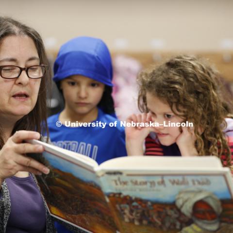 Brenda West, accounting technician from the Center for Science, Mathematics and Computer Education, reads at the YMCA of Lincoln-Northeast as part of the Husker Reading Challenge. The UNL students reading at the Y are part of the Chancellor's Leadership Class. Students, faculty and staff are invited to honor King’s legacy through a day of service. In collaboration with Prosper Lincoln and Read Aloud Lincoln, the Center for Civic Engagement at Nebraska will host the reading challenge. January 21, 2019. Photo by Craig Chandler / University Communication.