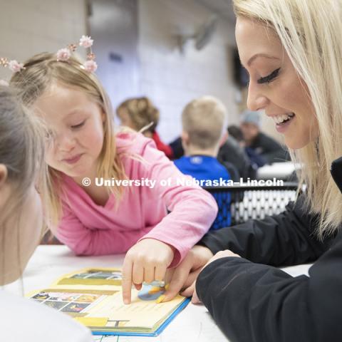 Jordyn Senstock, freshman in Nutrition and Health Sciences, reads at the YMCA of Lincoln-Northeast as a part of the Husker Reading Challenge. The UNL students reading at the Y are part of the Chancellor's Leadership Class. Students, faculty and staff are invited to honor King’s legacy through a day of service. In collaboration with Prosper Lincoln and Read Aloud Lincoln, the Center for Civic Engagement at Nebraska will host the reading challenge. January 21, 2019. Photo by Craig Chandler / University Communication.