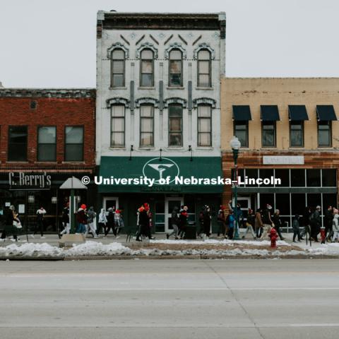 As part of MLK Week, UNL students march with Herbie Husker leading the way in a unifying march through downtown Lincoln and finish with a “Call to Action” program at the Nebraska State Capitol. January 21, 2019. Photo by Justin Mohling for University Communication.