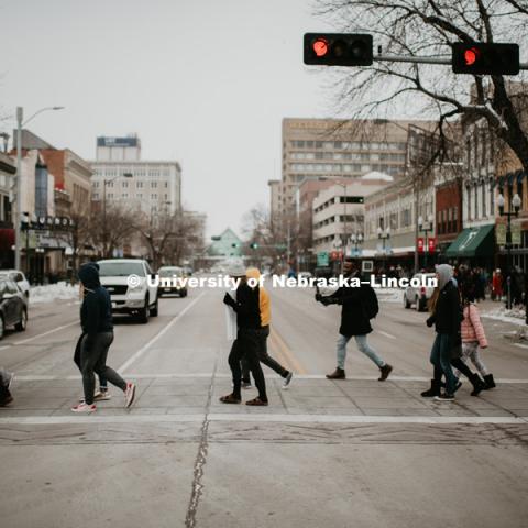 As part of MLK Week, UNL students march with Herbie Husker leading the way in a unifying march through downtown Lincoln and finish with a “Call to Action” program at the Nebraska State Capitol. January 21, 2019. Photo by Justin Mohling for University Communication.