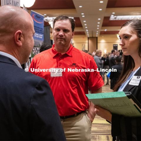 Jill Schindler talks with recruiters from Farm Bureau at the STEM Career Fair (Science, Technology, Engineering, and Math) in Embassy Suites. Sponsored by Career Services. February 12, 2019. Photo by Gregory Nathan / University Communication.