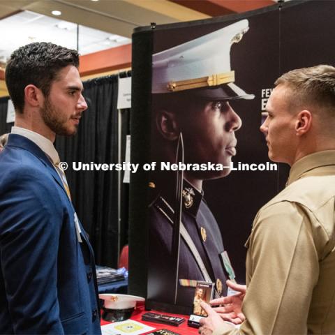 Taylor Gannon talks with a recruiter from The US Marines at the STEM Career Fair (Science, Technology, Engineering, and Math) in Embassy Suites. Sponsored by Career Services. February 12, 2019. Photo by Gregory Nathan / University Communication.