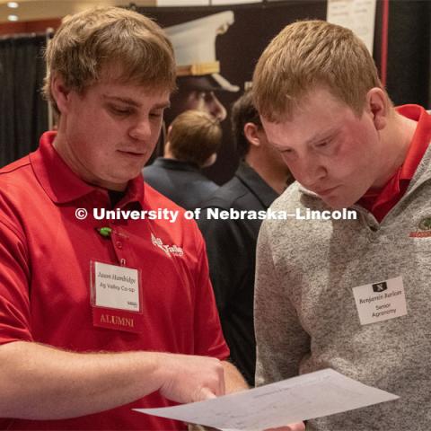 Benjamin Barlean speaks with a recruiter from Ag Valley C0-OP at the STEM Career Fair (Science, Technology, Engineering, and Math) in Embassy Suites. Sponsored by Career Services. February 12, 2019. Photo by Gregory Nathan / University Communication.