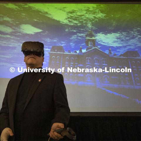 Steven Kolbe demonstrates a virtual reality reconstruction of Nebraska Hall. Kay Logan Peters gives a special Nebraska Lecture as part of Charter Week on the University's early architectural history before a crowd of more than 300 people. February 12, 2019. Photo by Craig Chandler/University Communication.