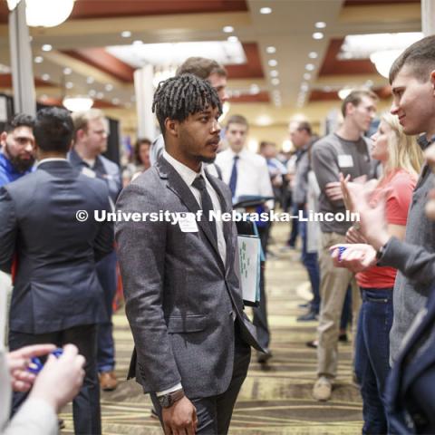 Jay Clark, senior in computer science, talks with a recruiter during day two of the Career Fair at Embassey Suites with emphasis on Science, Technology, Engineering and Mathematics. February 13, 2019.  Photo by Craig Chandler/University Communication.