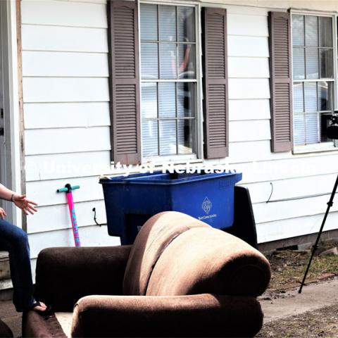 College of Journalism and Mass Communications Broadcast major Jacob Bova interviews Fremont, Nebraska resident Heather Pena outside her flood damaged home. A major flood from the nearby Platte River struck the city on March 13 April 1, 2019.  Photo by Bernard McCoy / College of Journalism and Mass Communications, University of Nebraska.