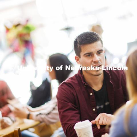 Law students hanging out in The Mill coffee house. College of Law photo shoot in Haymarket. April 4, 2019. Photo by Craig Chandler / University Communication.