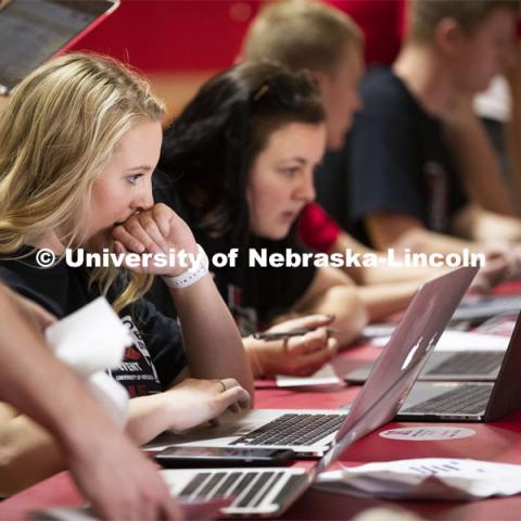 Executive team members check in teams Saturday morning. More than 2,500 University of Nebraska–Lincoln students, faculty and staff volunteered for the Big Event on April 6, completing service projects across the community. Now in its 13th year at Nebraska, the Big Event has grown to be the university's single largest student-run community service project. April 6, 2019. Photo by Craig Chandler / University Communication.