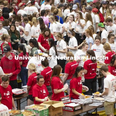 Volunteers fill the Coliseum as they fuel up on donated food before they head out to their job sites. More than 2,500 University of Nebraska–Lincoln students, faculty and staff volunteered for the Big Event on April 6, completing service projects across the community. Now in its 13th year at Nebraska, the Big Event has grown to be the university's single largest student-run community service project. April 6, 2019. Photo by Craig Chandler / University Communication.