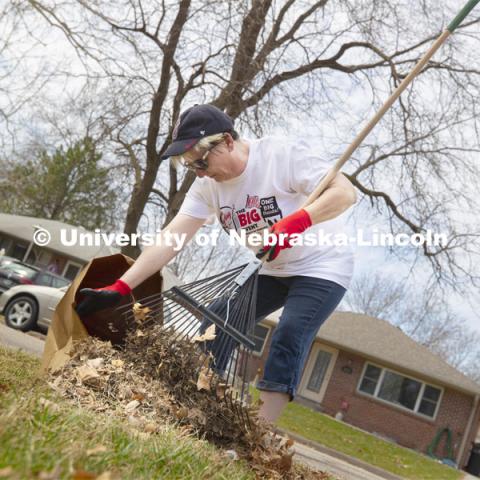 Irene Malzer was part of the Scholarship and Financial Aid team cleaning up a yard in the Big Event. More than 2,500 University of Nebraska–Lincoln students, faculty and staff volunteered for the Big Event on April 6, completing service projects across the community. Now in its 13th year at Nebraska, the Big Event has grown to be the university's single largest student-run community service project. April 6, 2019. Photo by Craig Chandler / University Communication.