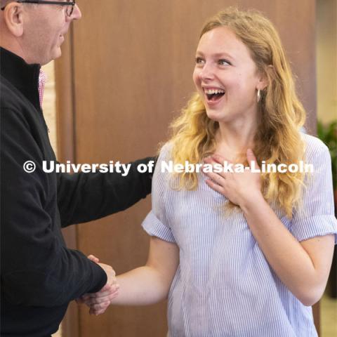 Emily Johnson, a junior at the University of Nebraska, reacts with surprise as Chancellor Ronnie Green tells her she has just been selected as a 2019 Truman Scholar. The Harry S. Truman Scholarship Foundation was created by Congress in 1975 to be the nation’s living memorial to President Harry S. Truman. The Foundation has a mission to select and support the next generation of public service leaders. The Truman award has become one of the most prestigious national scholarships in the United States. April 8, 2019. Photo by Craig Chandler / University Communication.