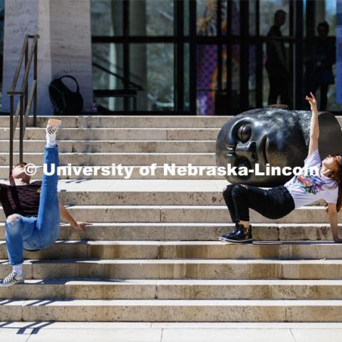 With the Sheldon's Fallen Dreamer as an audience, Cody Hartshorn and Yanzhu Jiang work on their performance piece for the Modern 3-4 dance class. Spring day on city campus as the temperatures reached the 80s. April 8, 2019. Photo by Craig Chandler / University Communication.