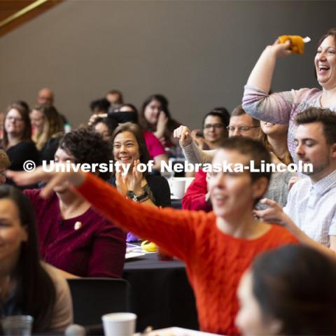 The crowd lobs tokens of its appreciation at the stage at the 2019 Science Slam held at Wick Alumni Center. April 9 2019. Photo by Craig Chandler / University Communication.