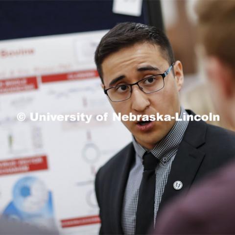 Yaid Puente discusses his research on Sequencing and Cloning a Bovine Adenovirus. Undergraduate Spring Research Fair in the Union ballrooms. April 15, 2019. Photo by Craig Chandler / University Communication.