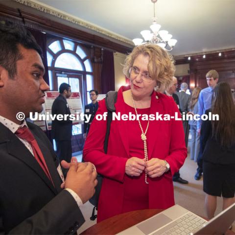 Senator Sue Crawford of the District 45 at the poster session. This year's research day at the capitol was held at the neighboring Ferguson House. State Senators Research Fair at the Ferguson House. April 16, 2019. Photo by Craig Chandler / University Communication.