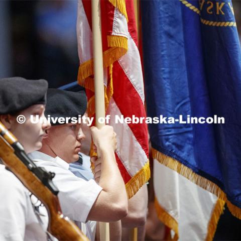 The color guard of the combined ROTC units. Undergraduate commencement at Pinnacle Bank Arena, May 4, 2019. Photo by Craig Chandler / University Communication.