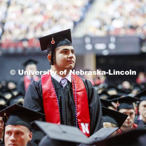 Juan Dominguez stands along with the other ROTC members of the graduating class. Undergraduate commencement at Pinnacle Bank Arena, May 4, 2019.  Photo by Craig Chandler / University Communication.