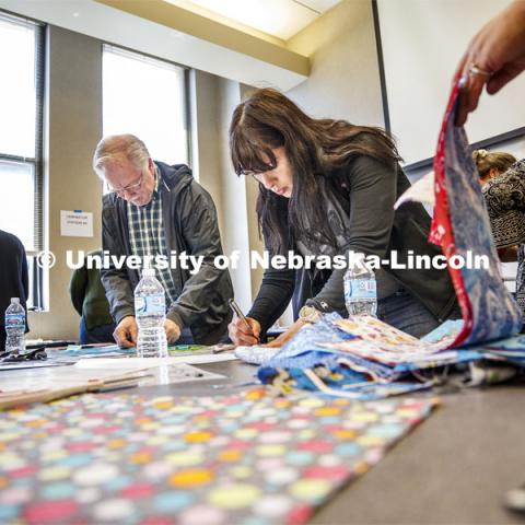 Jessica Jones with Johnson County Extension learns to make buttons in the Library Innovation Studios training class. Library Innovation Studios training for rural Nebraska librarians being taught by Nebraska Innovation Studio in the Atrium building in downtown Lincoln, Nebraska. May 22, 2019. Photo by Craig Chandler / University Communication.